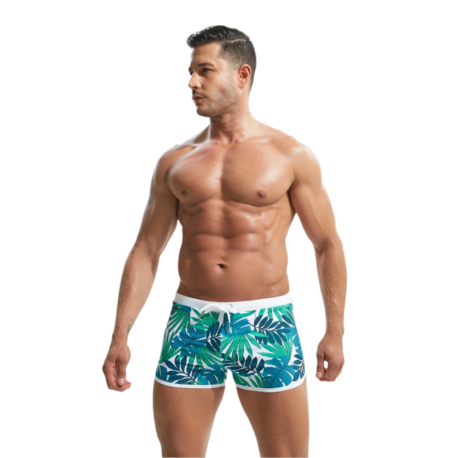 Blue and green leaf-patterned swim shorts with a white waistband.