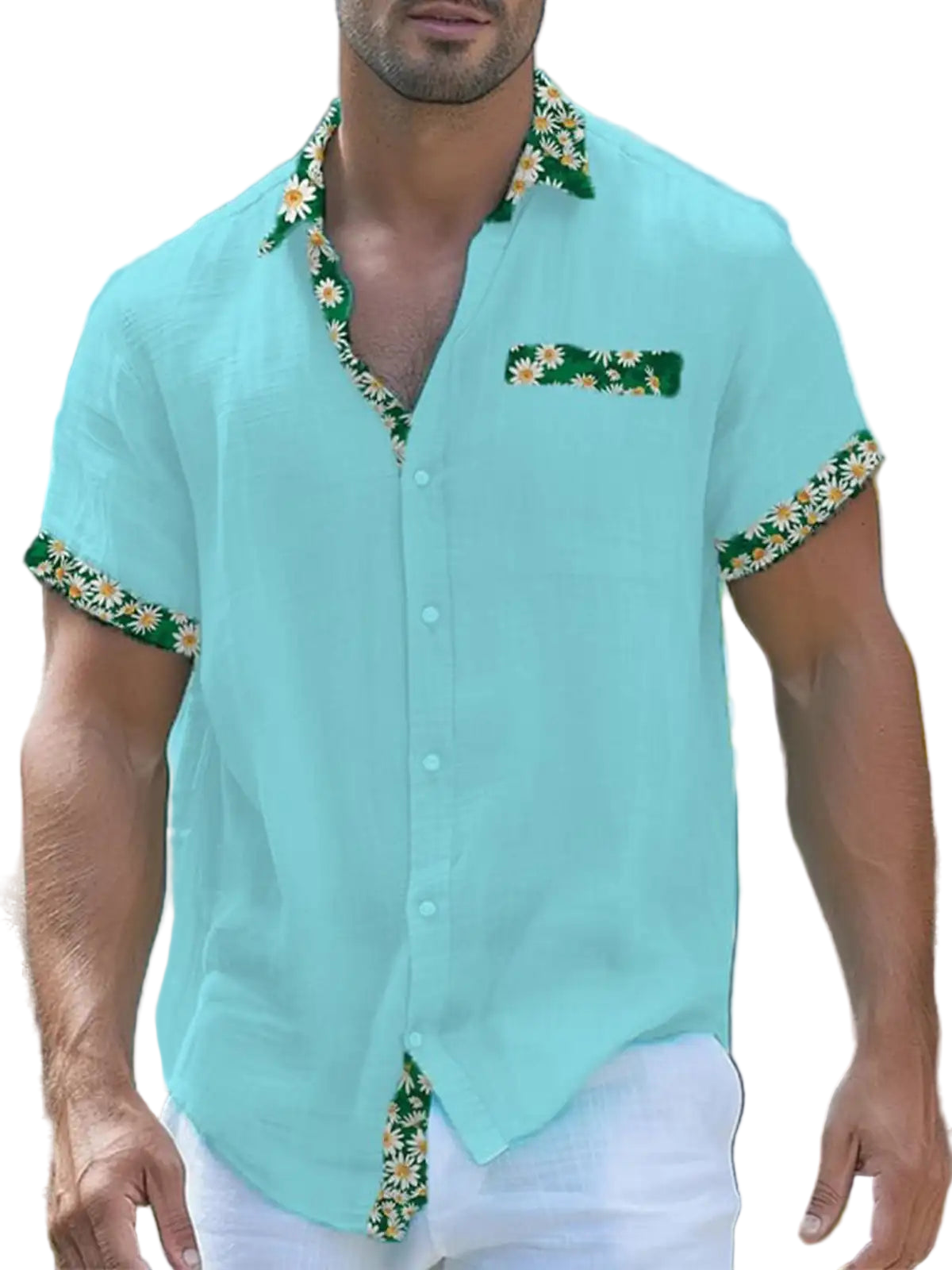 Man wearing a light blue shirt with floral patterns in an outdoor setting
