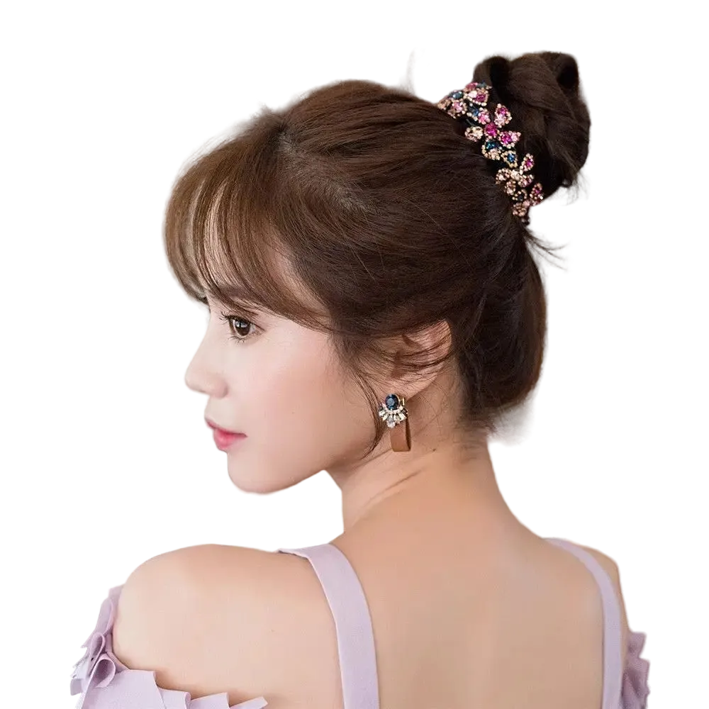 A woman shown from the back and side profile wearing a decorative hair accessory in a bun, with an earring visible. The hair accessory is a jeweled hair clip or hairpiece in pink, blue, and green tones.