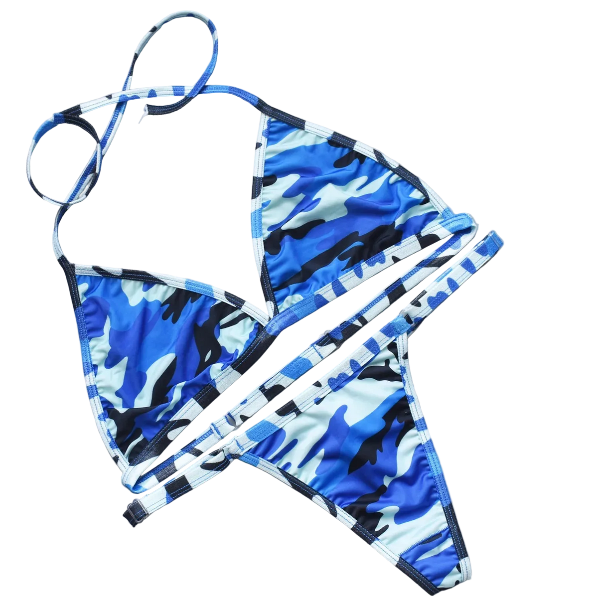 Blue and white camouflage bikini set on a gray surface with decorative elements.