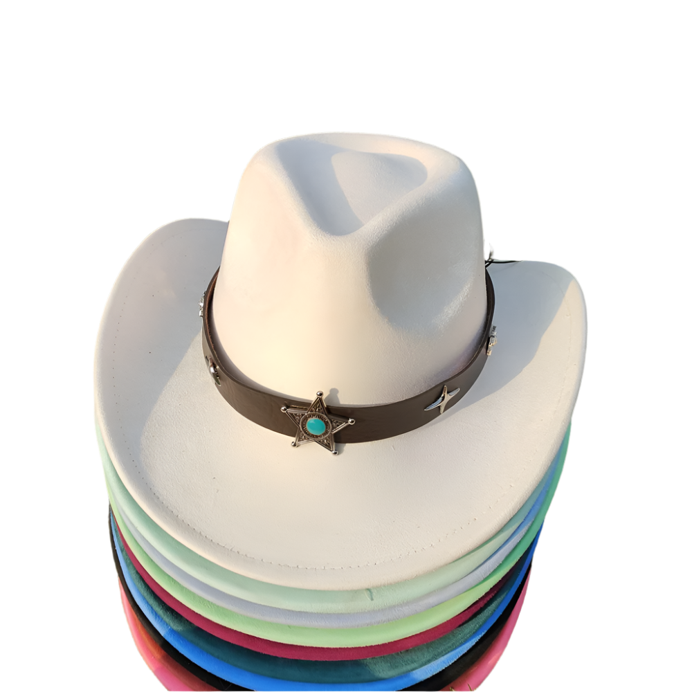 Stack of colorful cowboy hats with a white top hat on grass