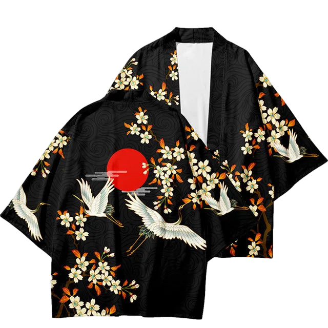 Black kimono-style jacket with crane and floral patterns on a white background