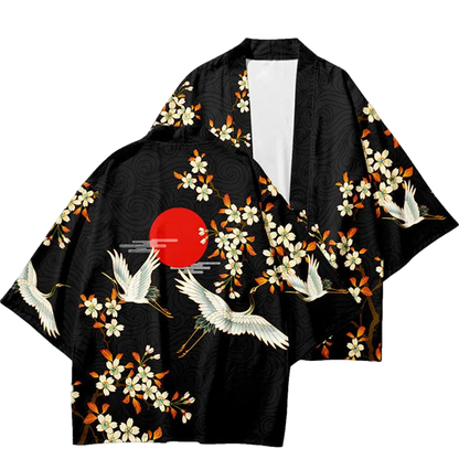 Black kimono-style jacket with crane and floral patterns on a white background