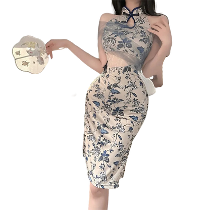 Person wearing a floral dress in a bedroom setting