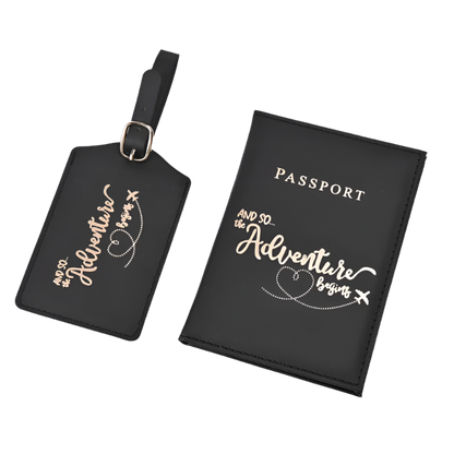 A passport holder and luggage tag set with the phrase "And so the adventure begins" in elegant script. The design is sleek and stylish, perfect for travel.