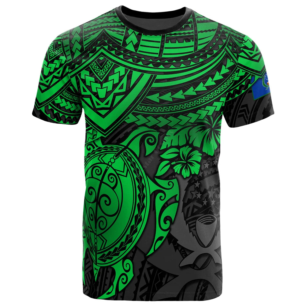 Green and black tribal-patterned t-shirt with turtle and floral designs.