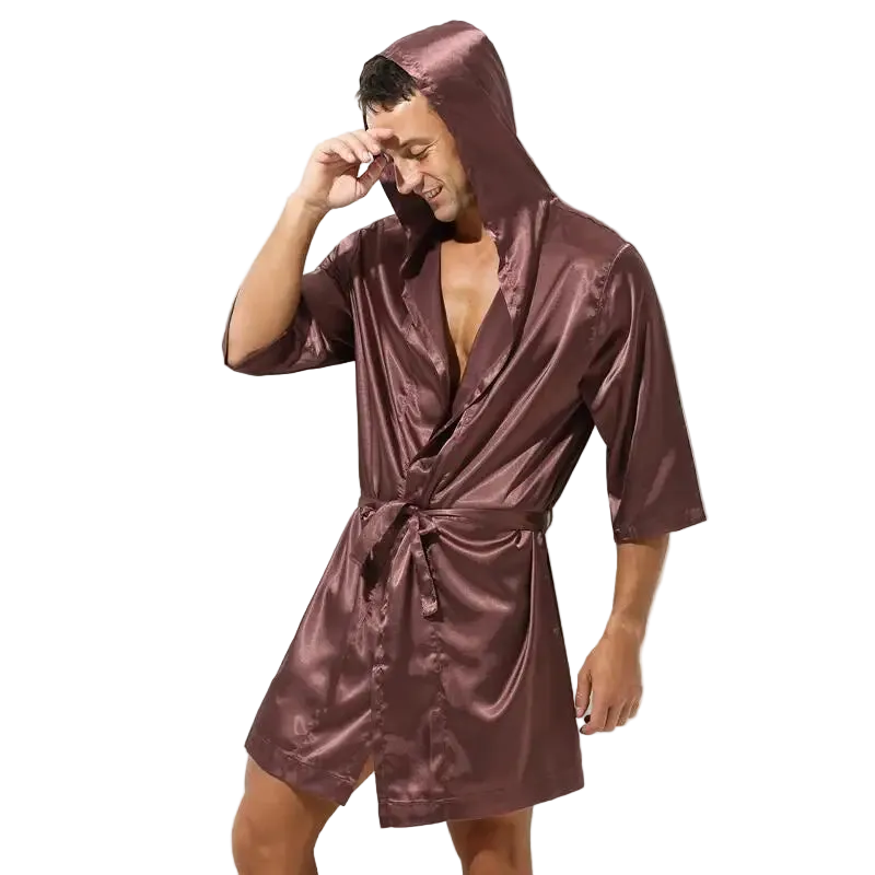 Man wearing a satin robe on a white background
