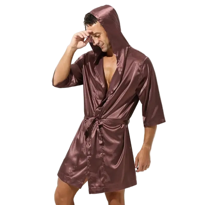 Man wearing a satin robe on a white background
