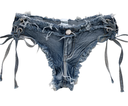 Denim bikini set with lace-up details on a textured surface