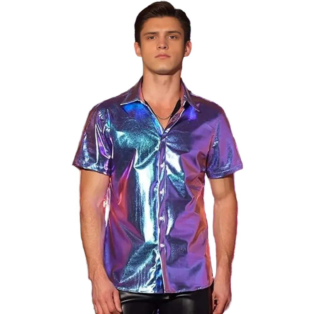 A man wearing a short-sleeve iridescent button-up shirt with a metallic purple, blue, and pink sheen, standing in front of a shiny tinsel curtain backdrop.