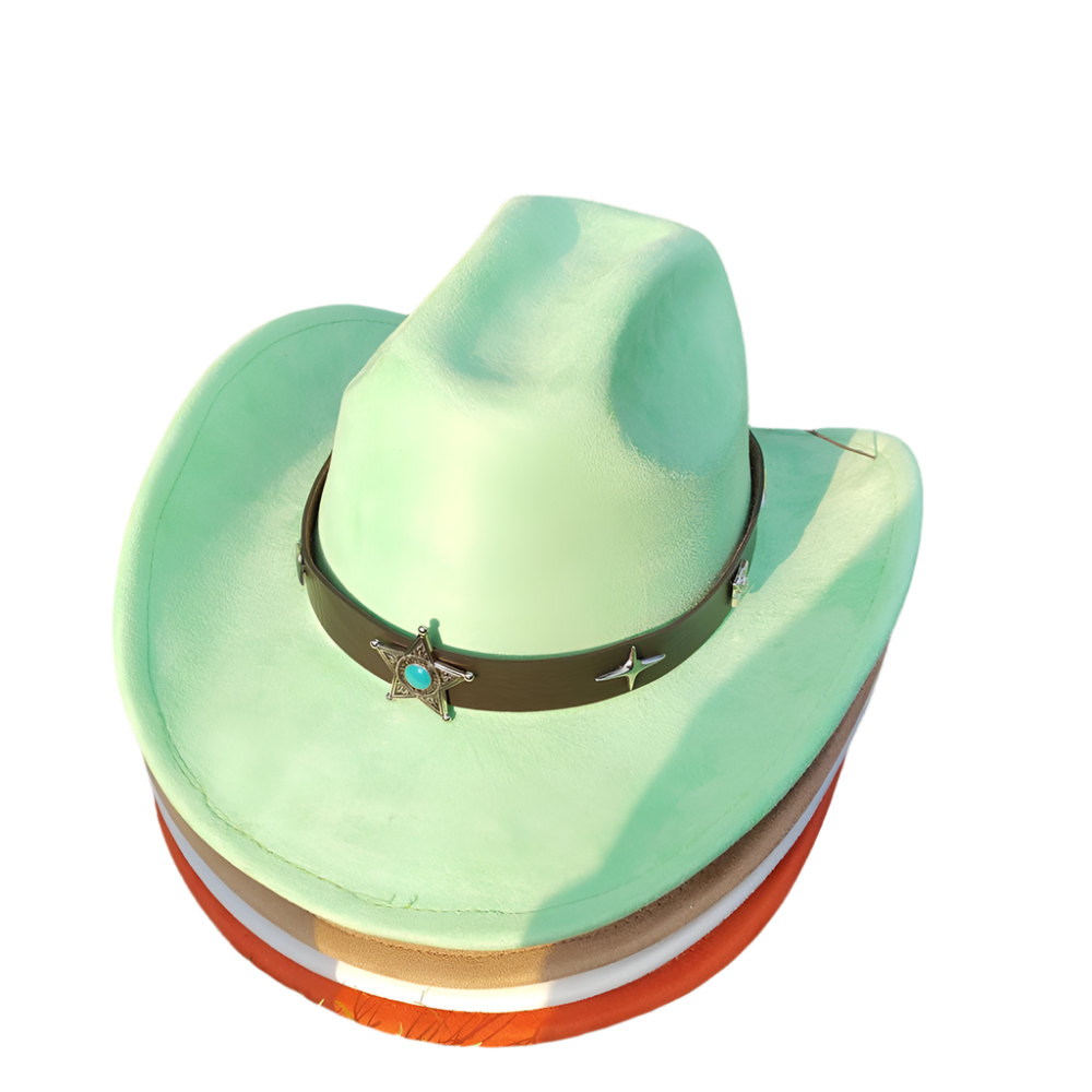 Green cowboy hat with a star and turquoise stone on a grassy background