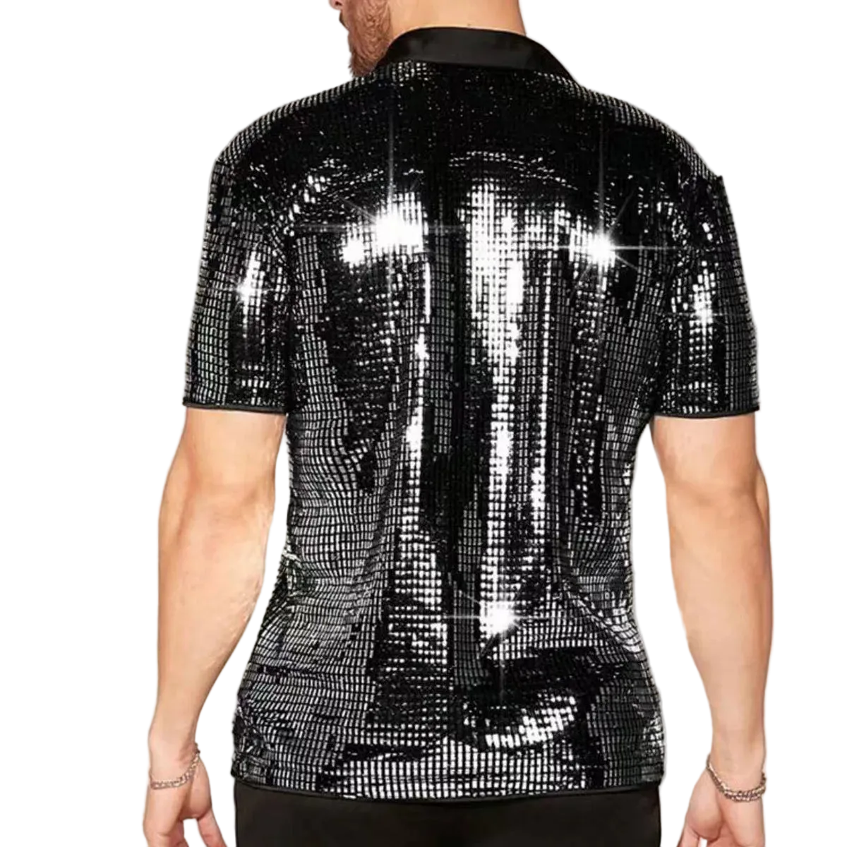 Person wearing a black sequin shirt on a plain background