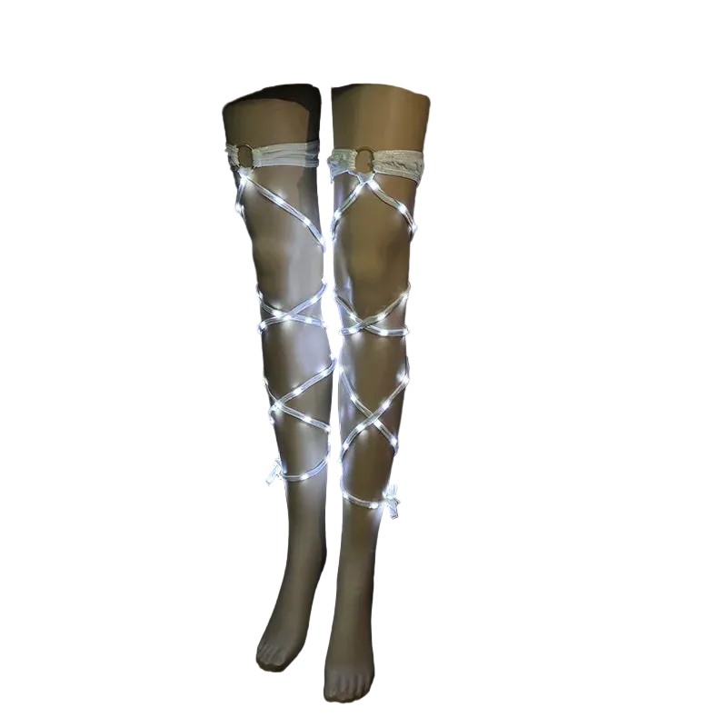 White LED knee-high socks on a black background
