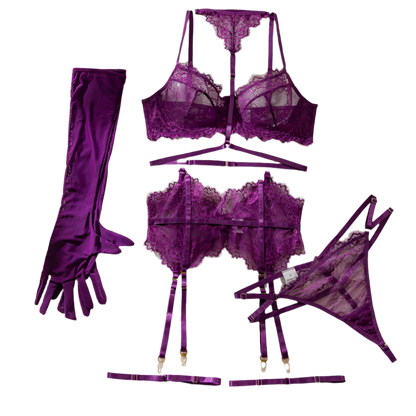 Purple lingerie set with gloves and a book on a white surface