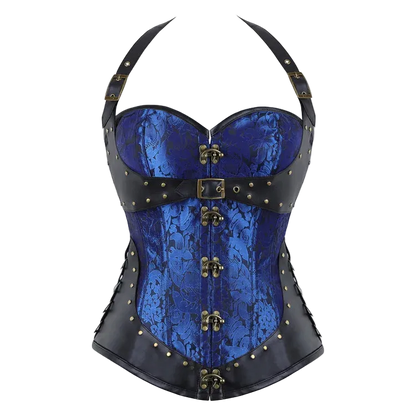 A steampunk-style corset top with a blue floral patterned fabric body, black faux-leather trim, and brass-tone metal hardware including buckles, studs, and lacing.