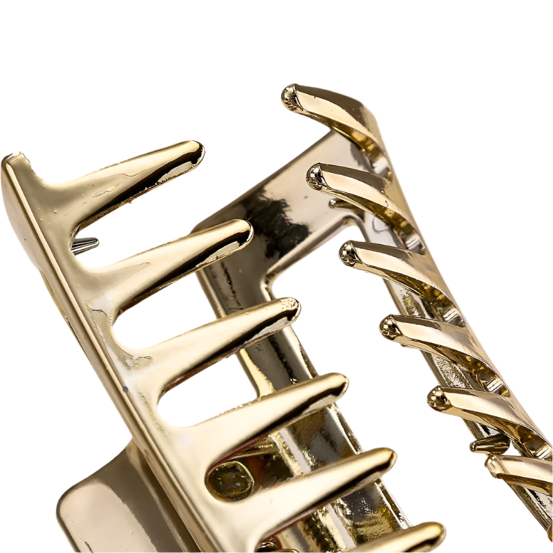 Gold spiral design on a light background