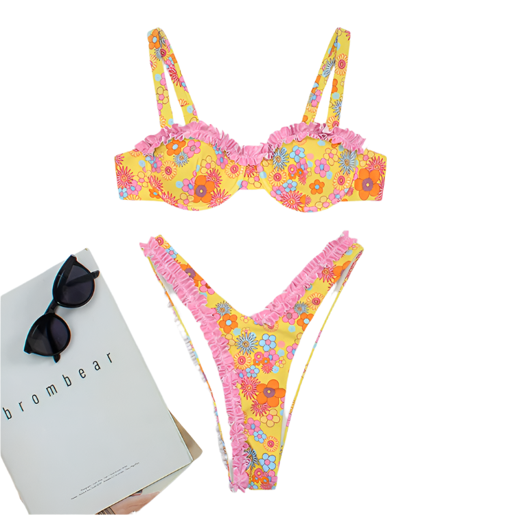 A vibrant bikini set with a yellow floral pattern and pink ruffle trim. The top has structured cups and adjustable straps, while the bottom features a high-cut design.