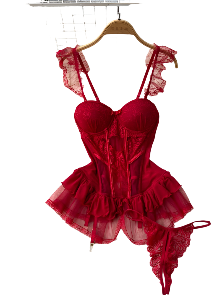 Red lace lingerie set on a hanger with flowers and a rug in the background