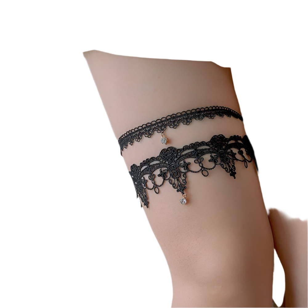 Crystal pendant lace garters with decorative thigh bands in white and black for resort evenings

