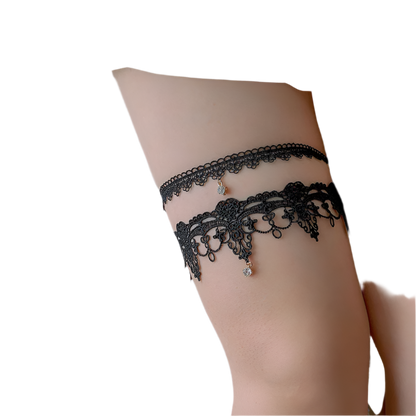 Crystal pendant lace garters with decorative thigh bands in white and black for resort evenings

