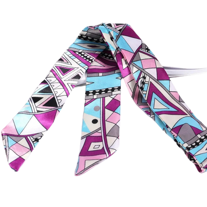 Colorful geometric patterned scarf on a white background