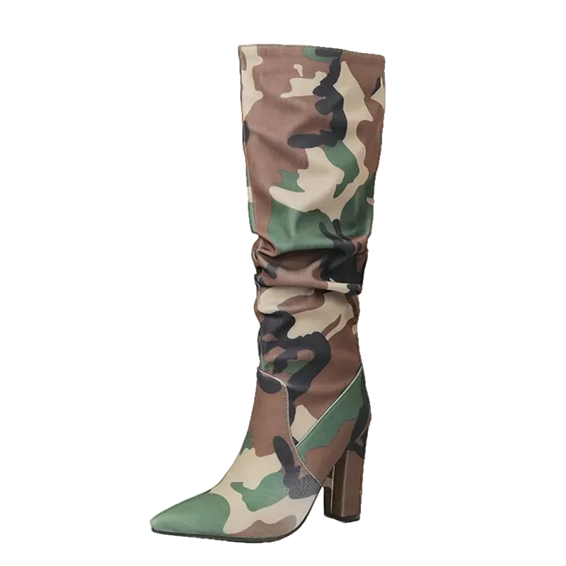 A single tall knee-high boot with a camouflage pattern in green, brown, beige, and black, featuring a pointed toe and a chunky block heel. The boot is shown on a plain white background 