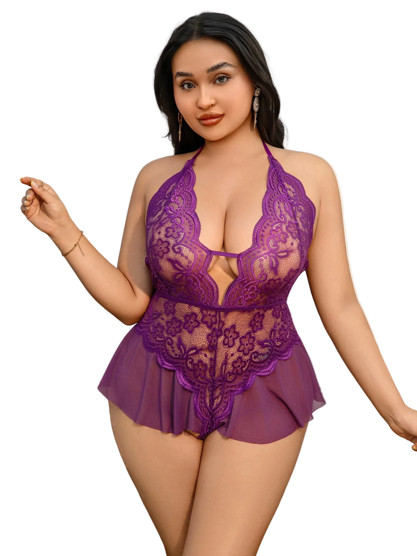 Woman wearing a purple lace lingerie set in a room with a wooden cabinet and decorative lamp.