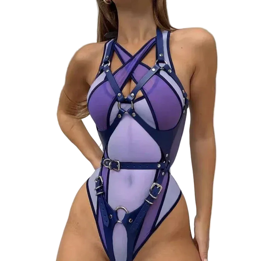 A model wearing a purple and navy blue strappy bodysuit with silver buckles and rings, shown against a plain light gray background. The brand name 'TOUCHEART' is printed vertically on the left side of the image.