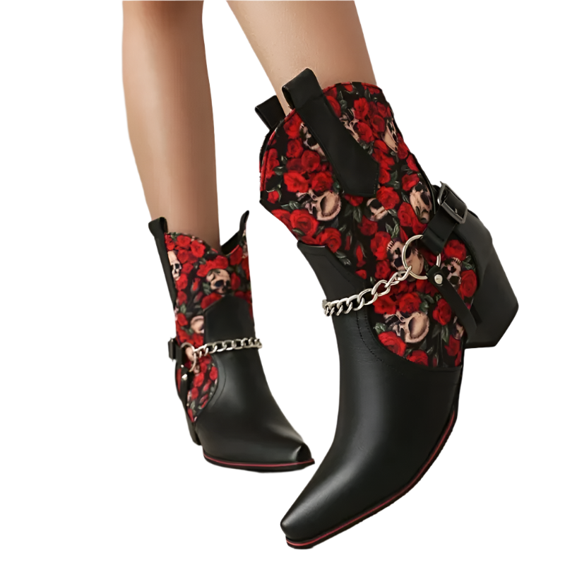 Black ankle boots with red floral and chain design on a neutral background