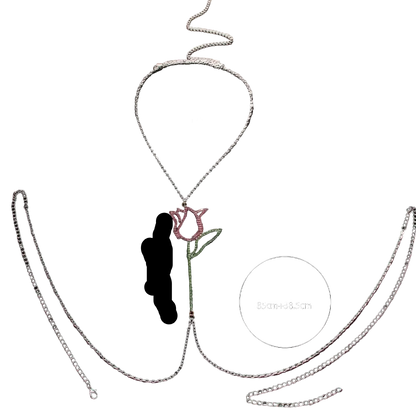Silver chain necklace with a rose-shaped pendant featuring a pink top and green stem, displayed on a dark background with measurement circles and weight text '34.9g'.