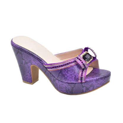 Purple high-heeled shoe with embellishments on a white background