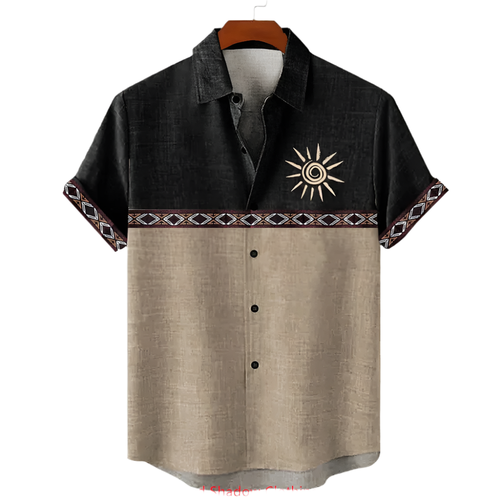 Black and beige shirt with sun design on a hanger against a white background