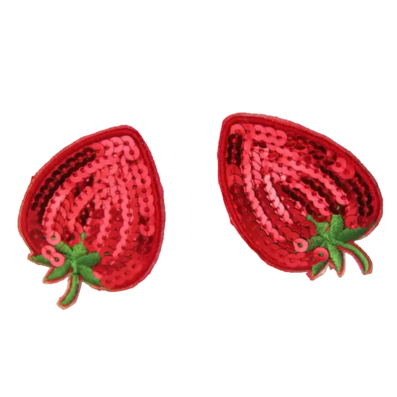 Red sequin strawberry-shaped patches on a white background