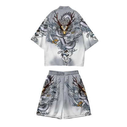 Two-piece outfit with dragon and deer design on a white background