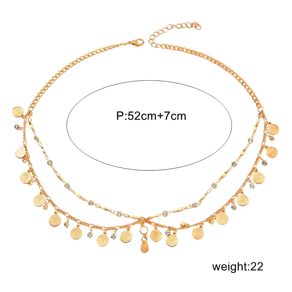 A gold-toned double-layered chain anklet with dangling coin charms and clear crystal accents, shown on a white background with a measurement circle reading 'P:52cm+7cm' and weight text 'weight:22g'.