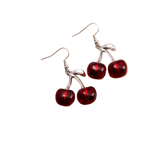 Cherry-themed earrings on a beige jewelry box