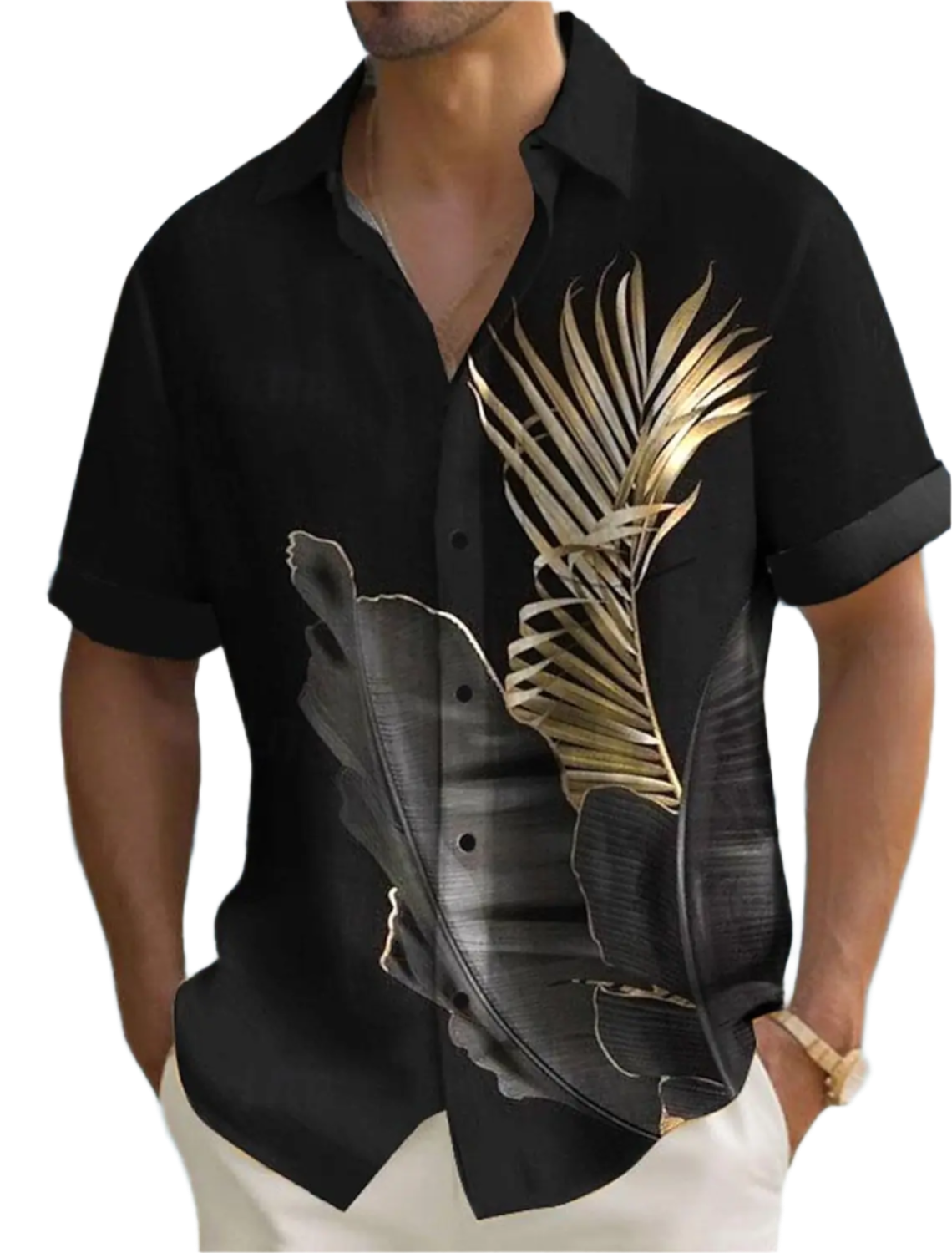 Black shirt with gold leaf design worn by a person, with a blurred outdoor background.