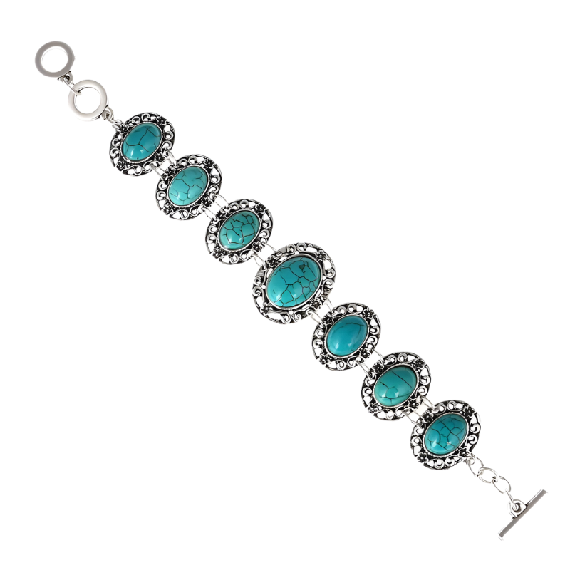Turquoise stone bracelet with silver accents on a white background