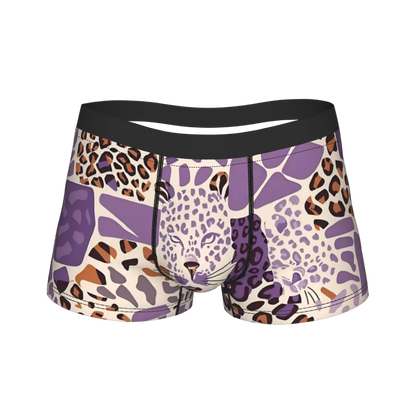 A pair of men's boxer briefs featuring a purple, beige, and brown animal print pattern with a stylized leopard face on the front, set against a plain white background.