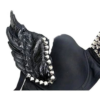 Black bra with a large wing-shaped shoulder strap and silver metallic studs, shown on a plain white background.