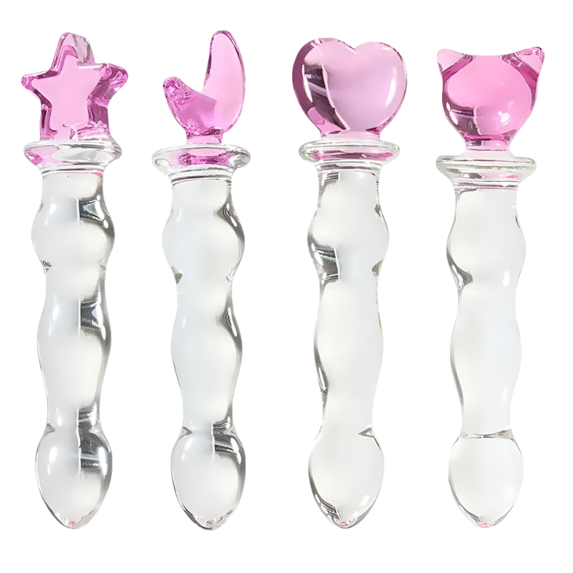 Glass Wand Set: A set of four glass wands with clear bodies and pink decorative tops in shapes of a star, crescent moon, heart, and cat ears.