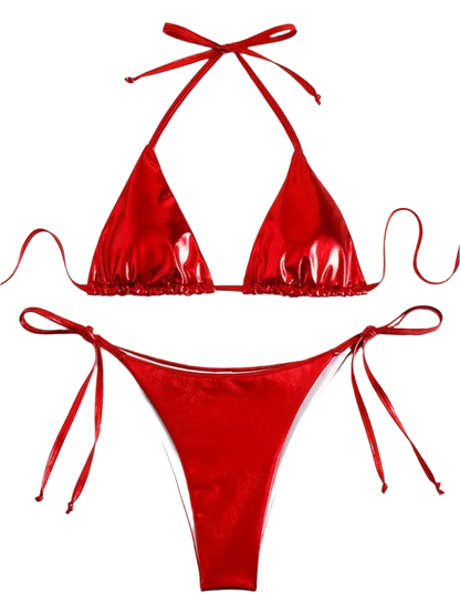 A shiny, iridescent bikini in shades of red. It features a classic triangle top and tie-side bottoms, creating a vibrant and eye-catching beachwear style.