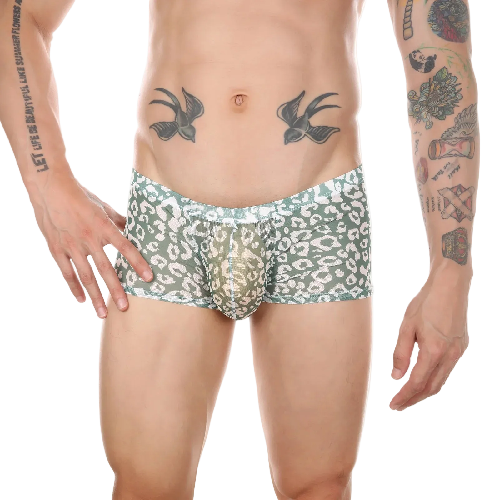 A man's lower torso wearing men's boxer briefs with a sage green and white animal print pattern, shown against a plain white background.