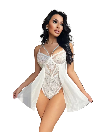 A woman models a white lace bodysuit with matching sheer open-front cover-up in a bedroom setting.