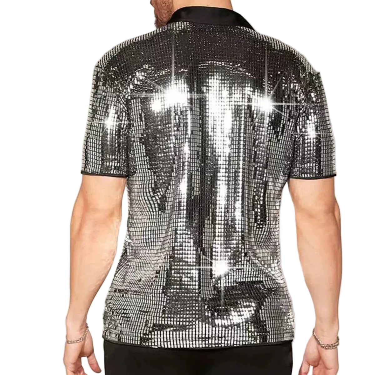 Person wearing a silver sequin shirt on a plain background