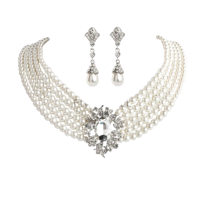 Complete Audrey Hepburn inspired accessory set with pearl necklace, earrings, gloves and cigarette holder for resort theme nights

