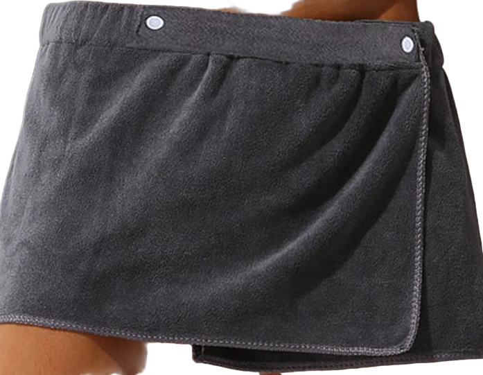 Gray towel skirt draped over a person's waist against a neutral background