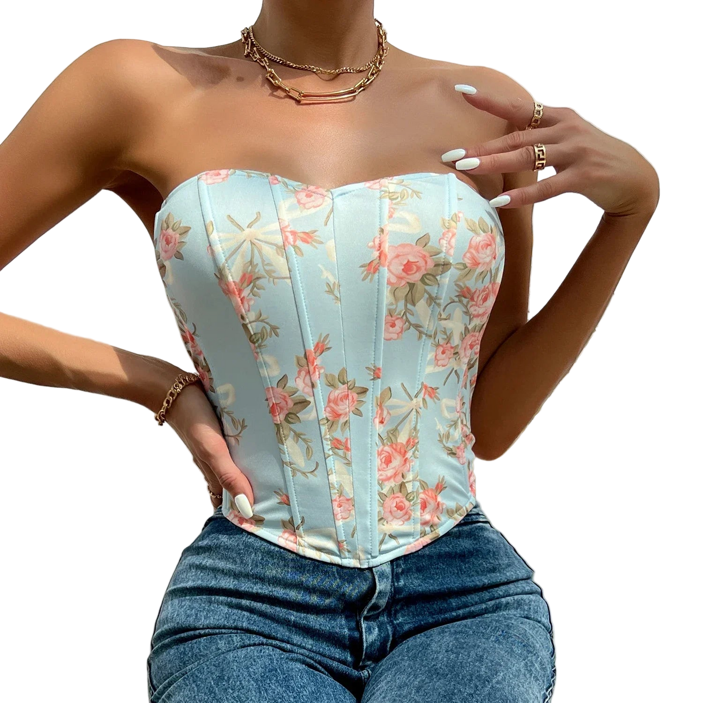 Woman wearing a floral corset top with a blurred background
