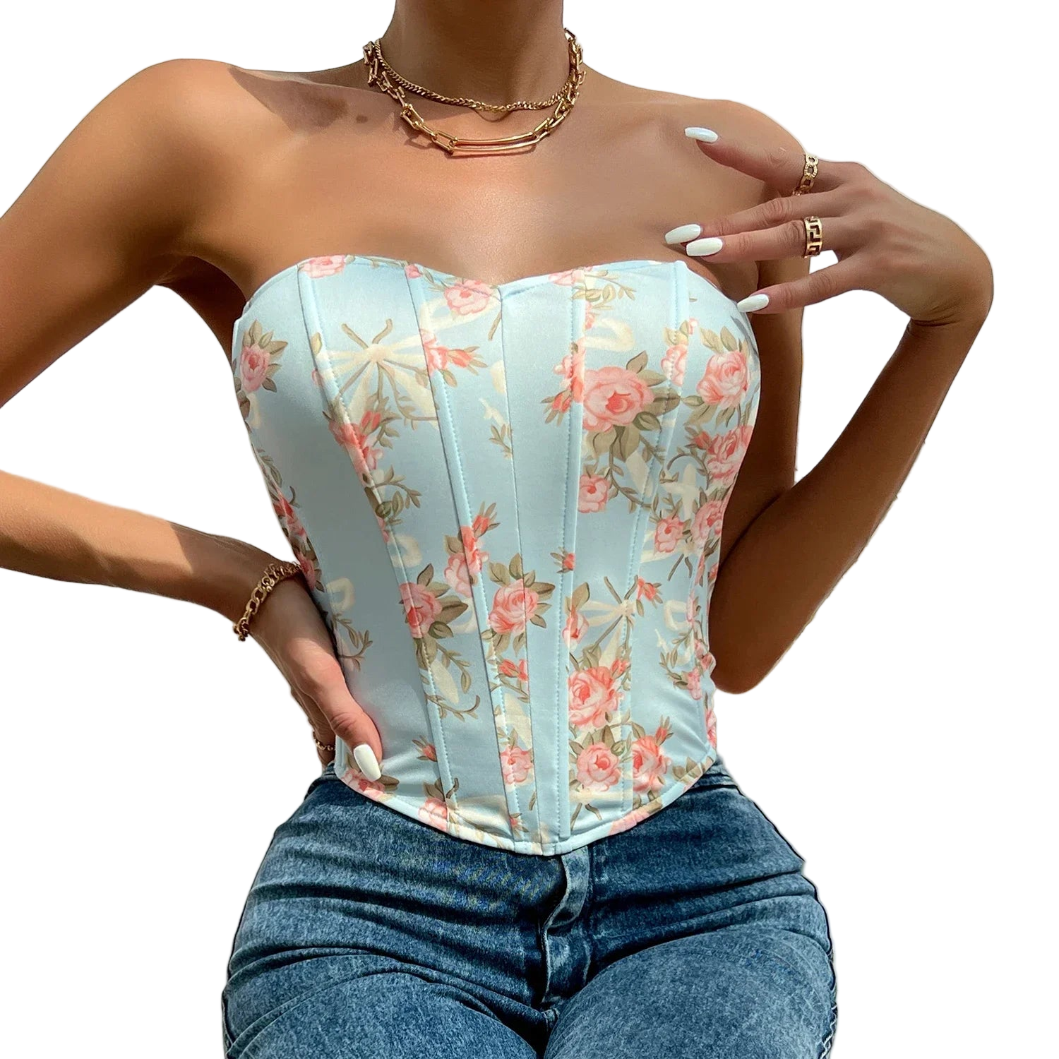 Woman wearing a floral corset top with a blurred background