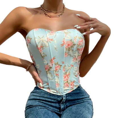 Woman wearing a floral corset top with a blurred background